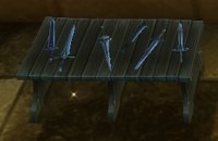 Item Étagère de couteaux de lancer.jpg